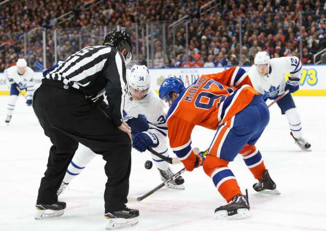 EDMONTON, AB - NOVEMBER 29: Connor McDavid #97 of the Edmonton Oilers faces off against Auston Matthews #34 of the Toronto Maple Leafs on November 29, 2016 at Rogers Place in Edmonton, Alberta, Canada. (Photo by Codie McLachlan/Getty Images)